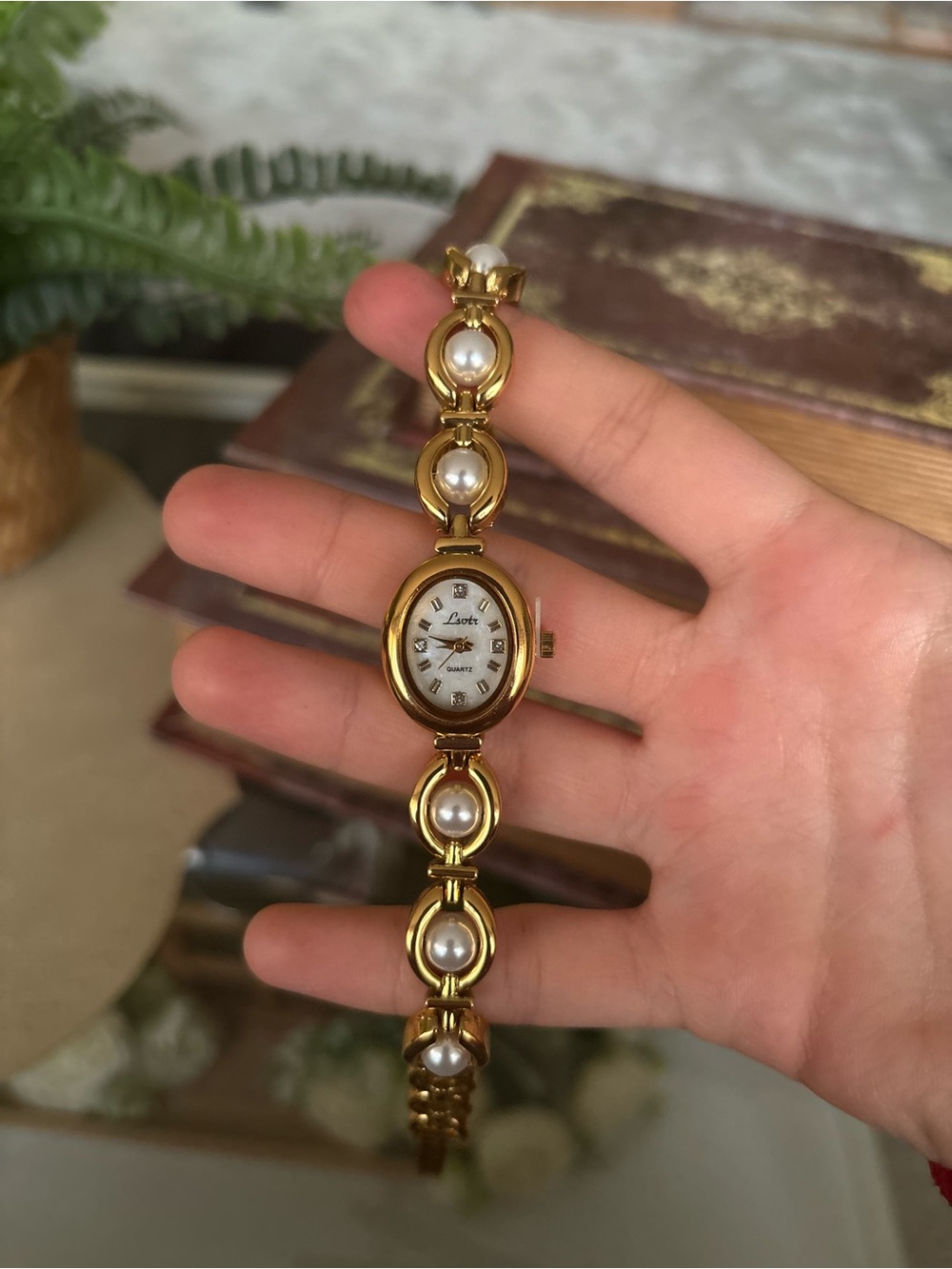 Gold Tone Oval Women’s Quartz Watch with Faux Pearl Bracelet Strap